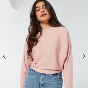 Ribbed dilemma sweater